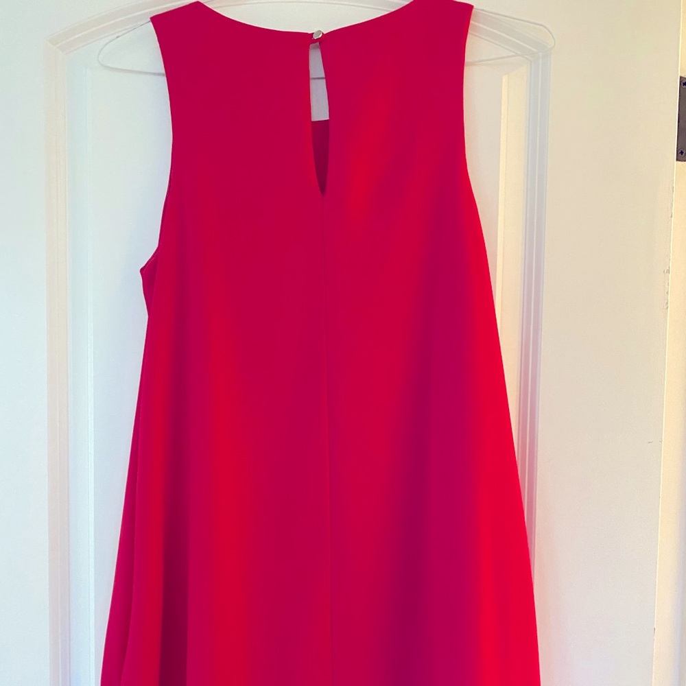 Pink dress with pockets.